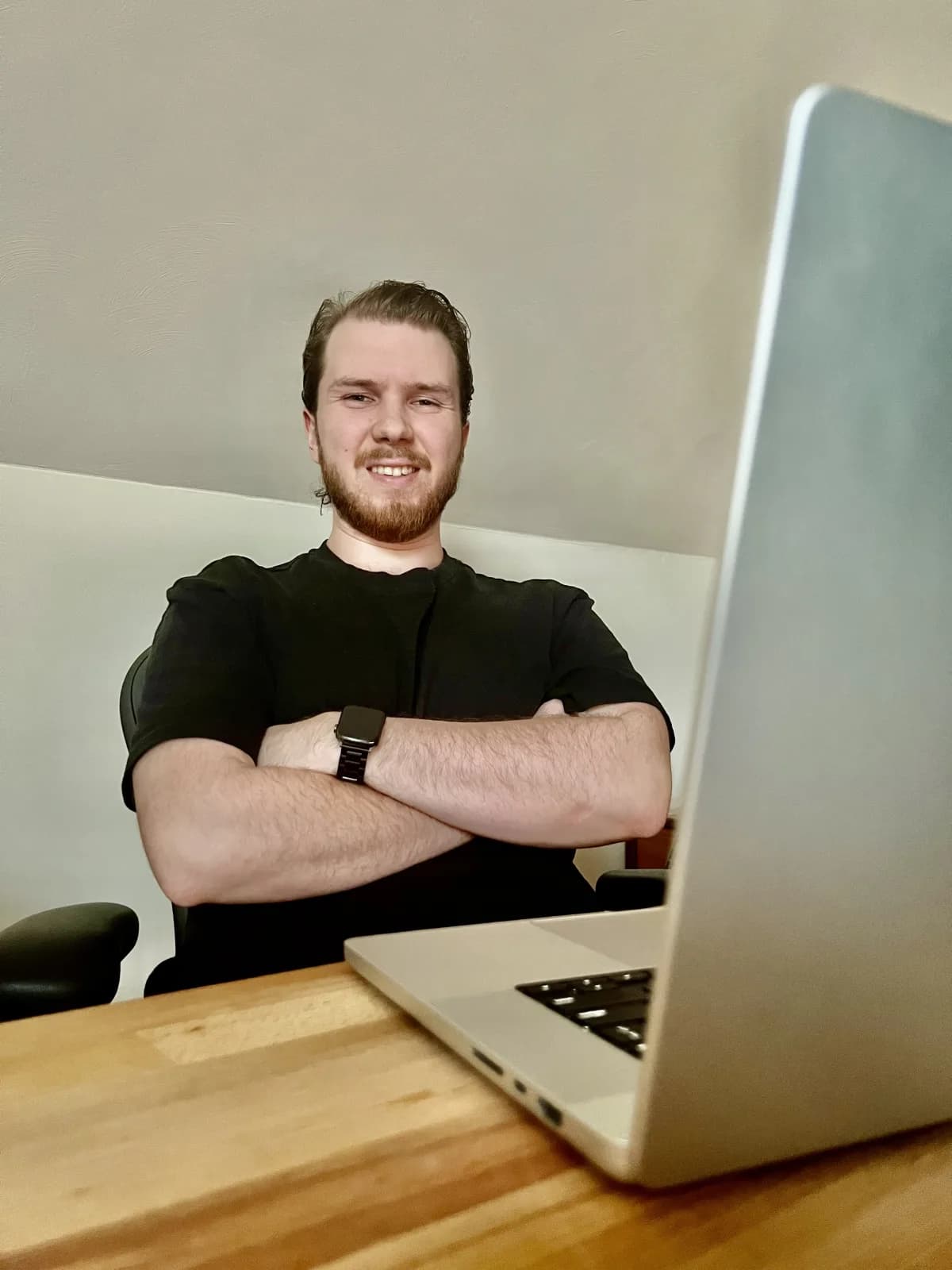 Jan Duras smiling at his desk
